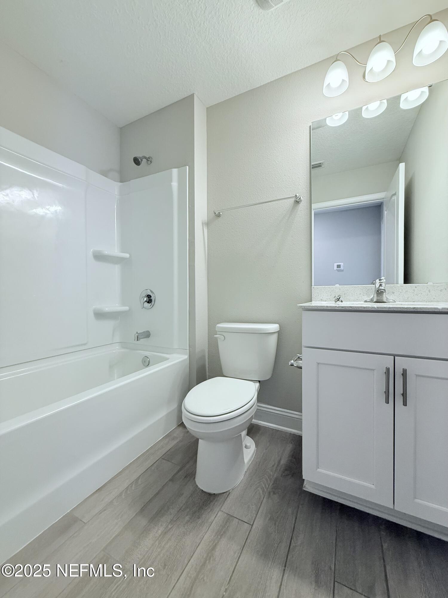 23 Alagon Way Street St. Augustine, FL 32084 - Photo 21 of 39 a bathroom with a sink a toilet and shower