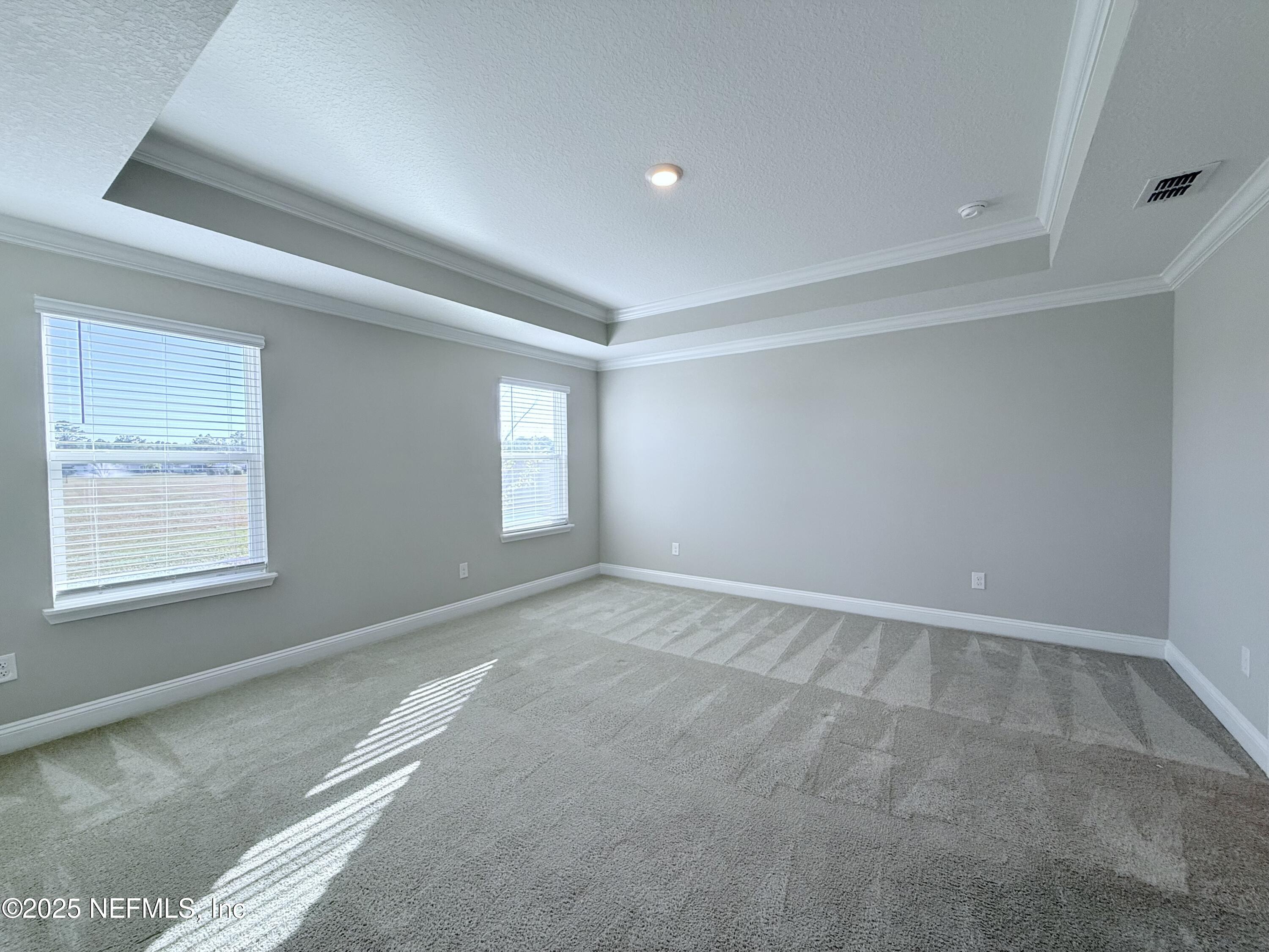 23 Alagon Way Street St. Augustine, FL 32084 - Photo 9 of 39 a view of an empty room with a window