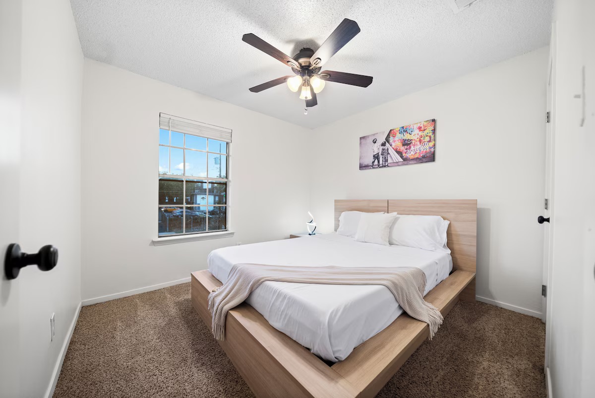 3507 Alpine Circle Austin, TX 78704 - Photo 11 of 30 a bedroom with a bed and window
