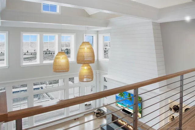 a view of living room and wooden floor