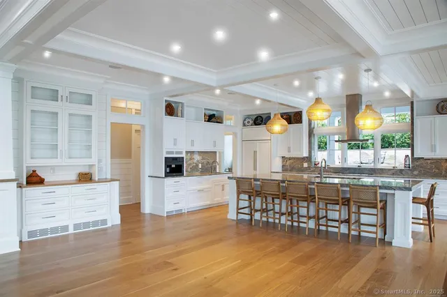 a view of staircase with a washer and dryer