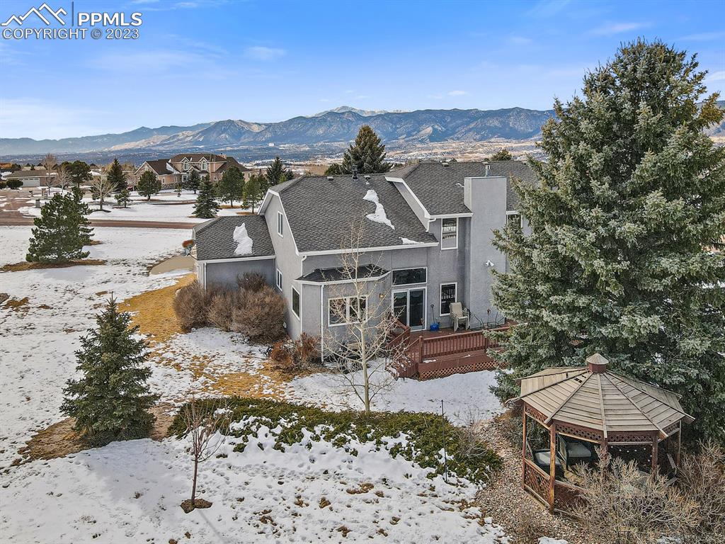 750 Bowstring Road Monument, CO 80132 - Photo 2 of 34 a view of a city with a building in the background
