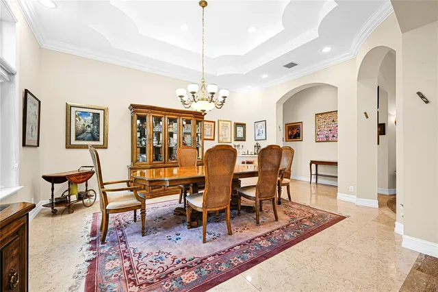a kitchen with stainless steel appliances granite countertop a stove oven and a sink