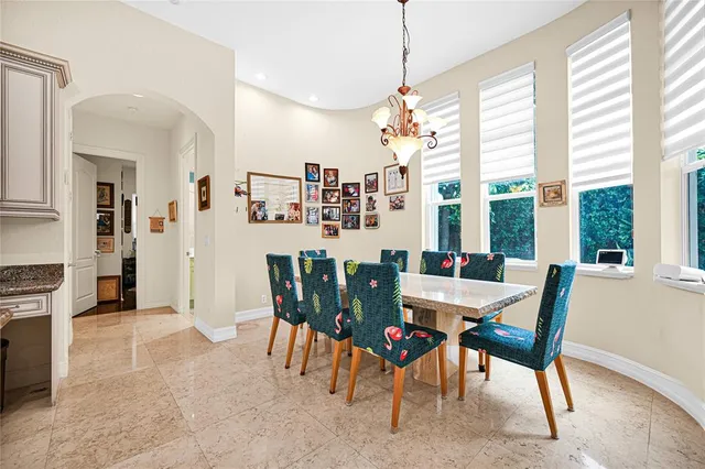 a view of a hallway with wooden floor and closet area