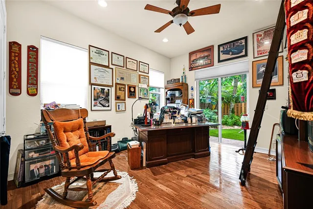 a bedroom with furniture and a window