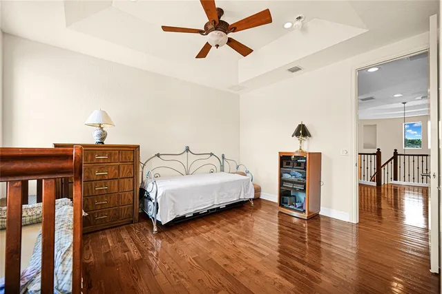 a view of a house with swimming pool and sitting area