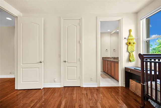 a view of a patio with table and chairs and potted plants