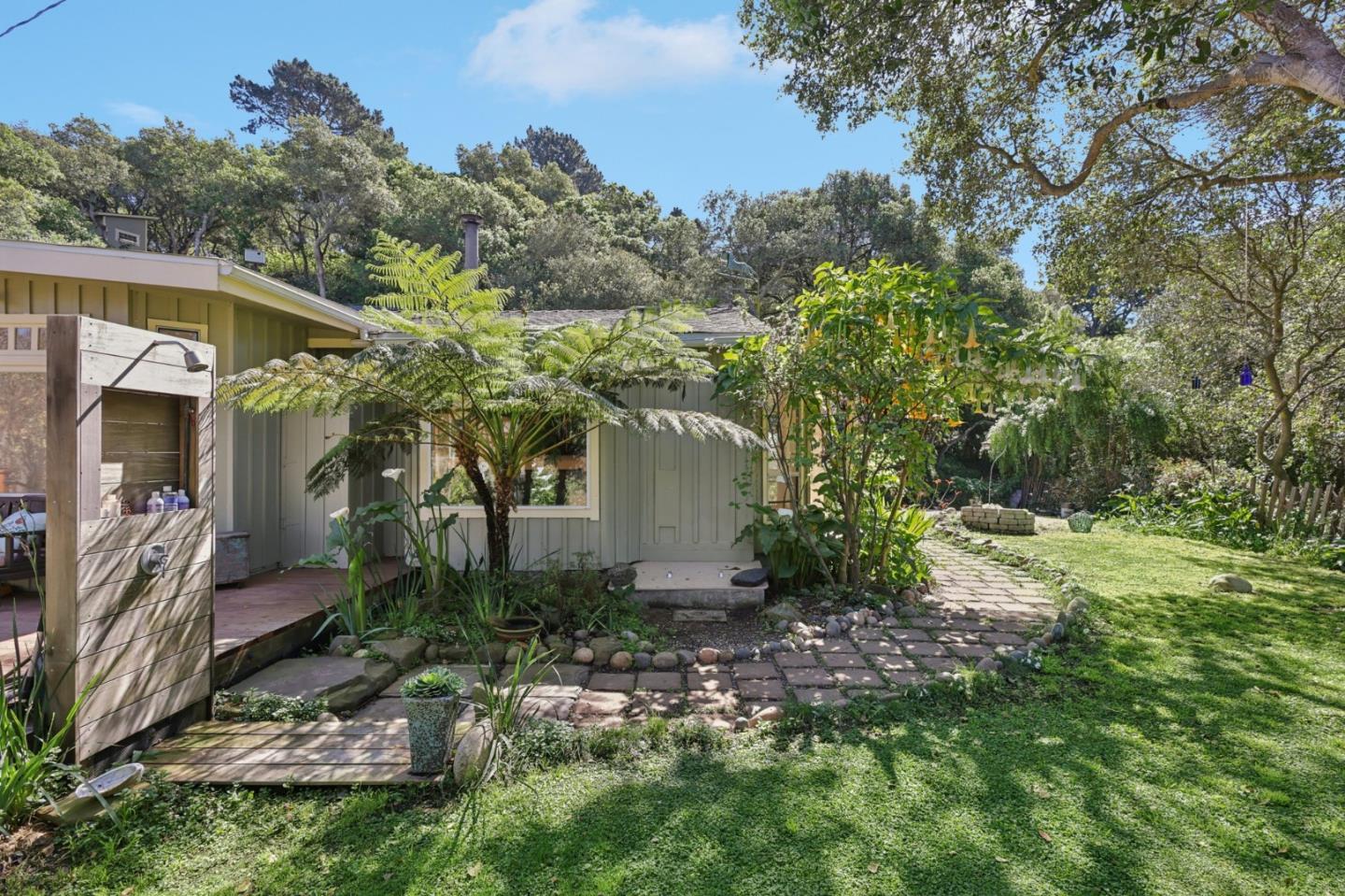 122 Strawberry Road Watsonville, CA 95076 - Photo 29 of 57 a backyard of a house with lots of green space