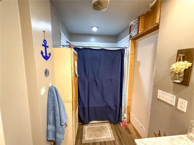 a view of walk in closet with window