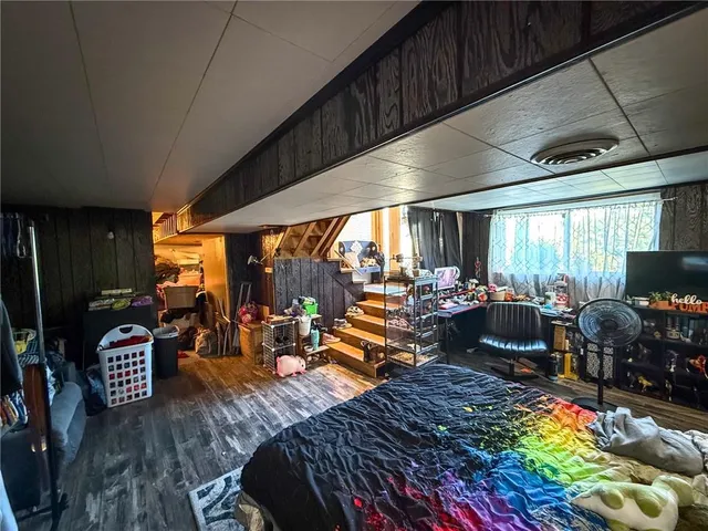 a living room filled with furniture and a table