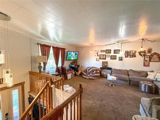 a view of a livingroom with furniture and a couch