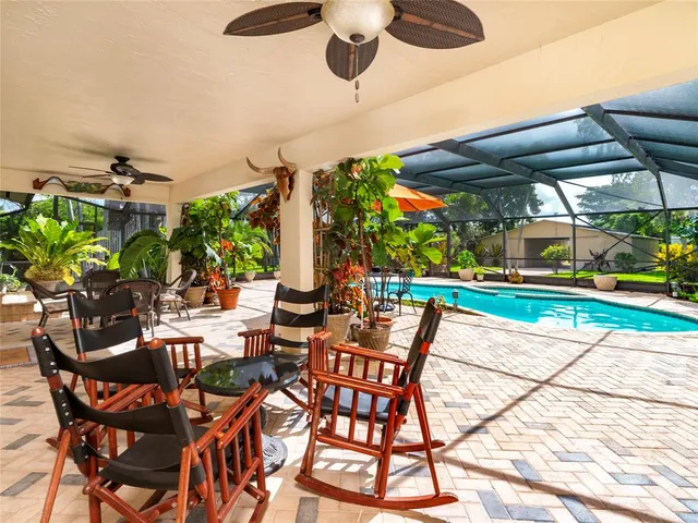 a view of an chairs and tables in patio