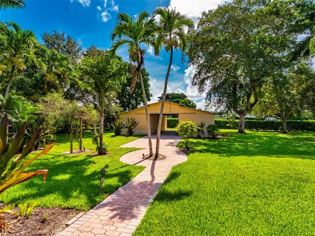 a view of a backyard with a garden