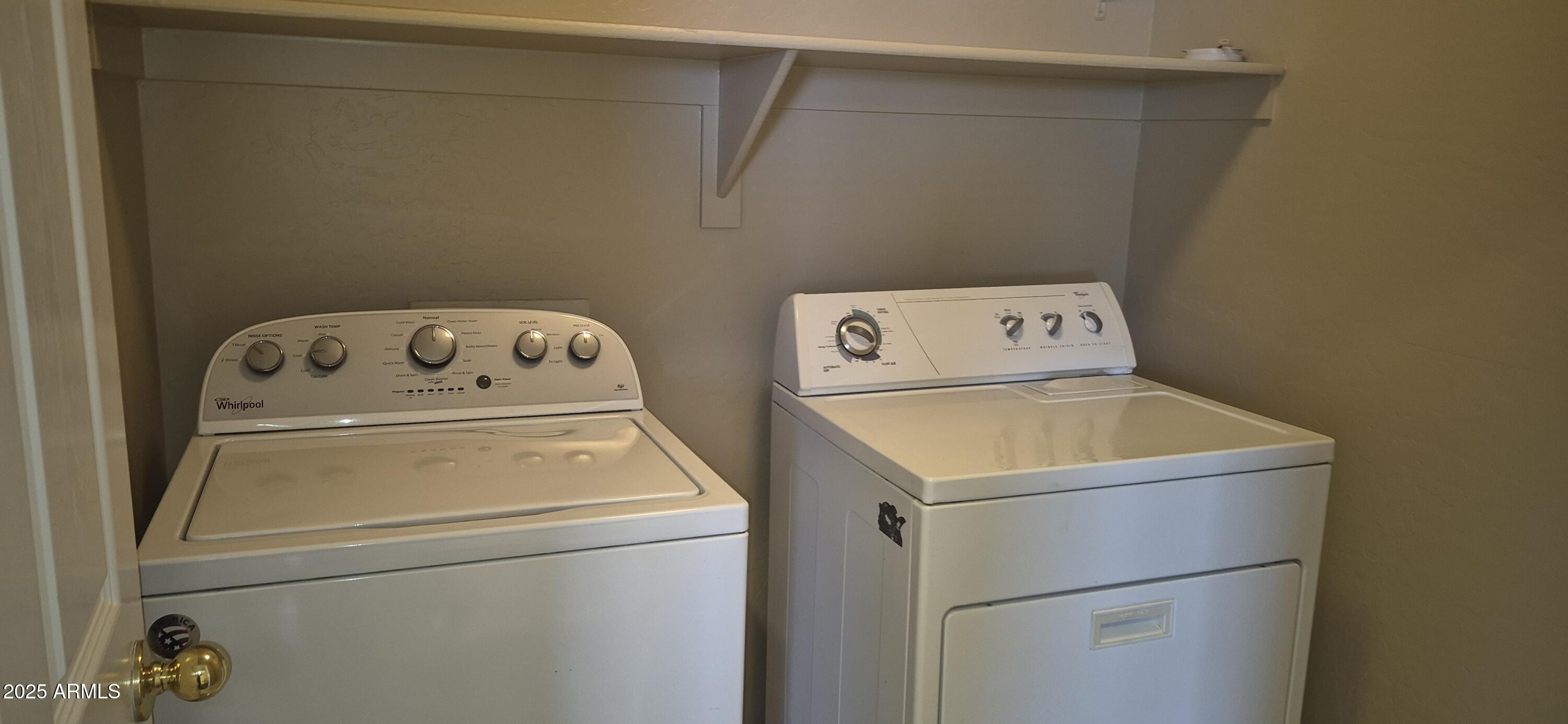 1347 East Dunbar Drive Phoenix, AZ 85042 - Photo 11 of 19 a utility room with dryer and washer