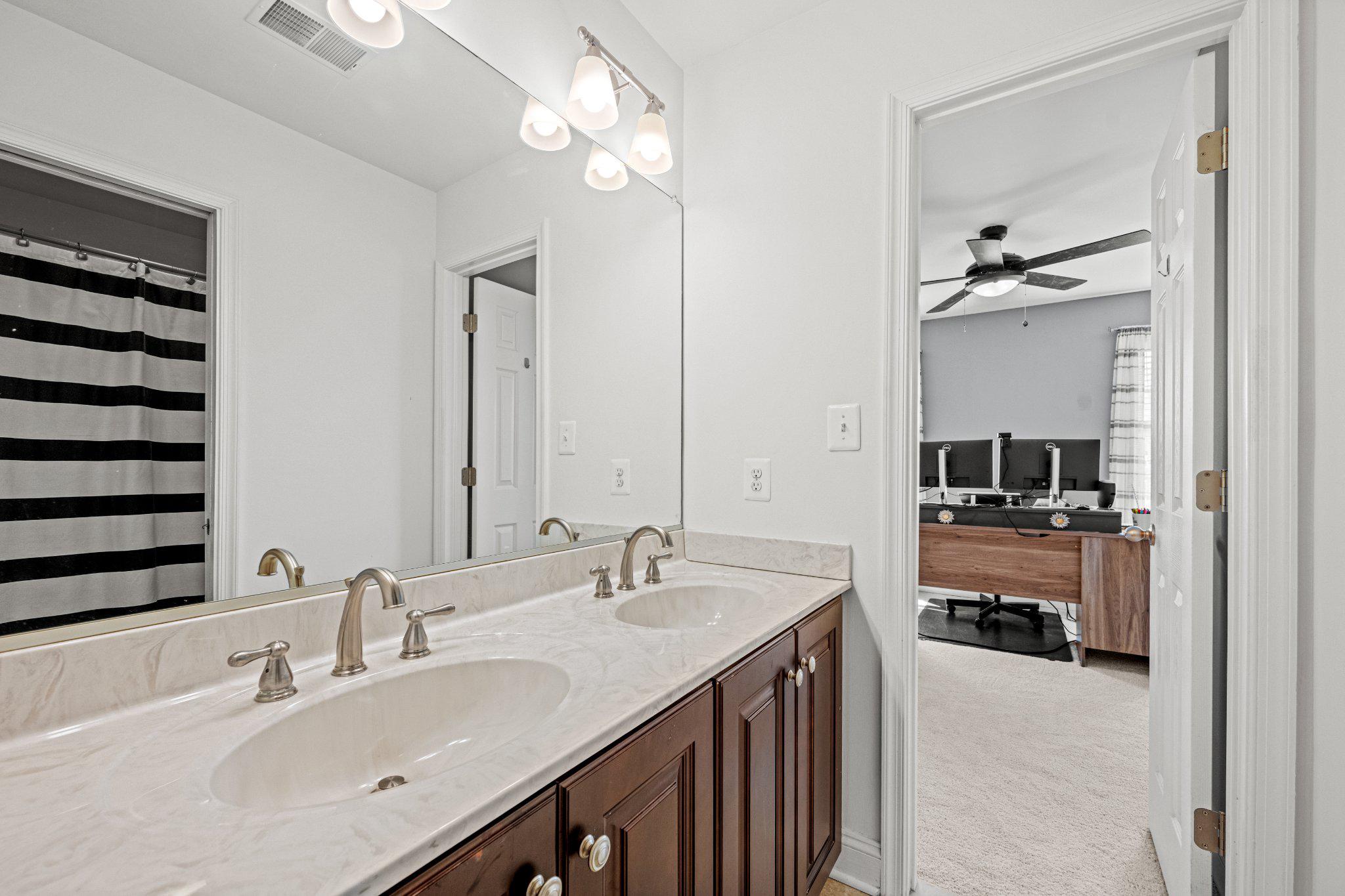 10693 Harding Road Laurel, MD 20723 - Photo 39 of 55 Full Jack and Jill Bathroom between Beds 3 and 4