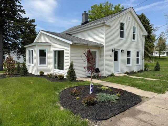 314 South High Street Granville, IL 61326 - Photo 2 of 22 a front view of a house with a yard