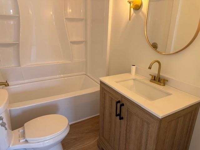 314 South High Street Granville, IL 61326 - Photo 21 of 22 a bathroom with a sink a toilet and a mirror
