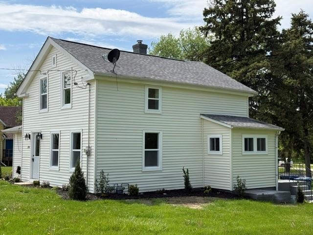 314 South High Street Granville, IL 61326 - Photo 5 of 22 a view of a house with a yard