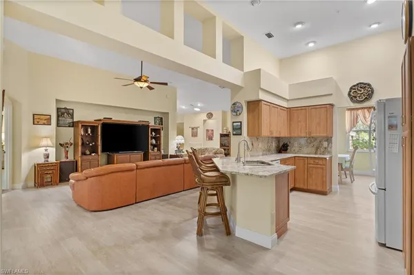 $727,500 | 1665 Winding Oaks Way, Unit 202, Naples, FL 34109