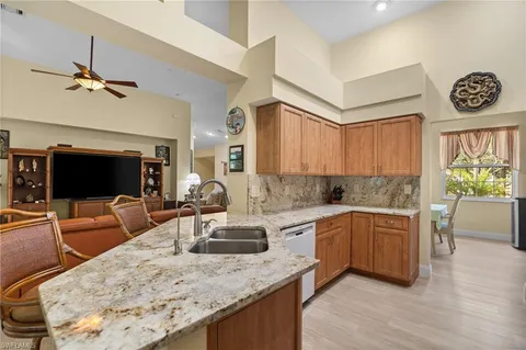 $770,000 | 1665 Winding Oaks Way, Unit 202, Naples, FL 34109