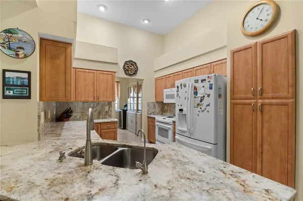 $727,500 | 1665 Winding Oaks Way, Unit 202, Naples, FL 34109