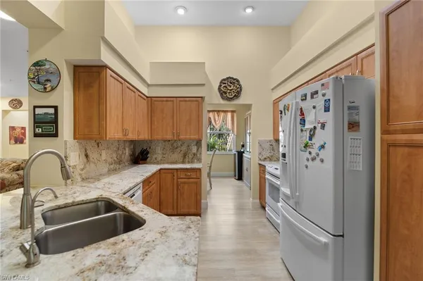 $727,500 | 1665 Winding Oaks Way, Unit 202, Naples, FL 34109