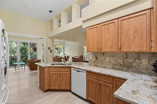 $727,500 | 1665 Winding Oaks Way, Unit 202, Naples, FL 34109