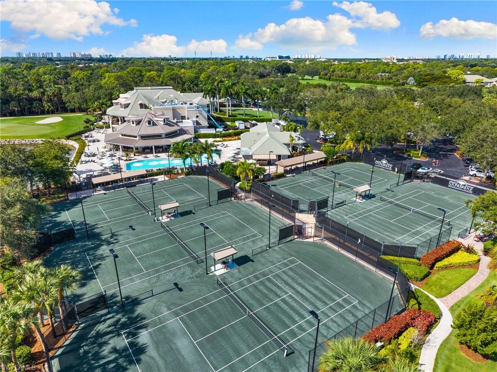 1665 Winding Oaks Way, Unit 202 Naples, FL 34109 - Photo 31 of 34 Aerial view of city skyline