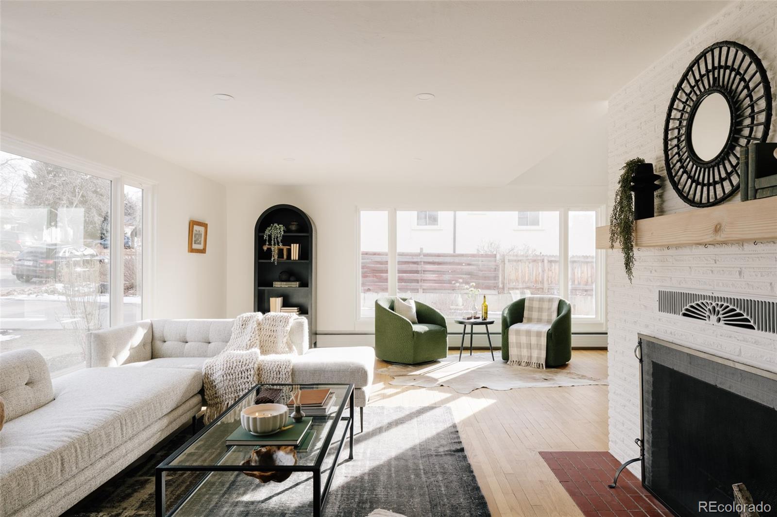 4035 Cody Street Wheat Ridge, CO 80033 - Photo 15 of 47 a living room with furniture and a large window