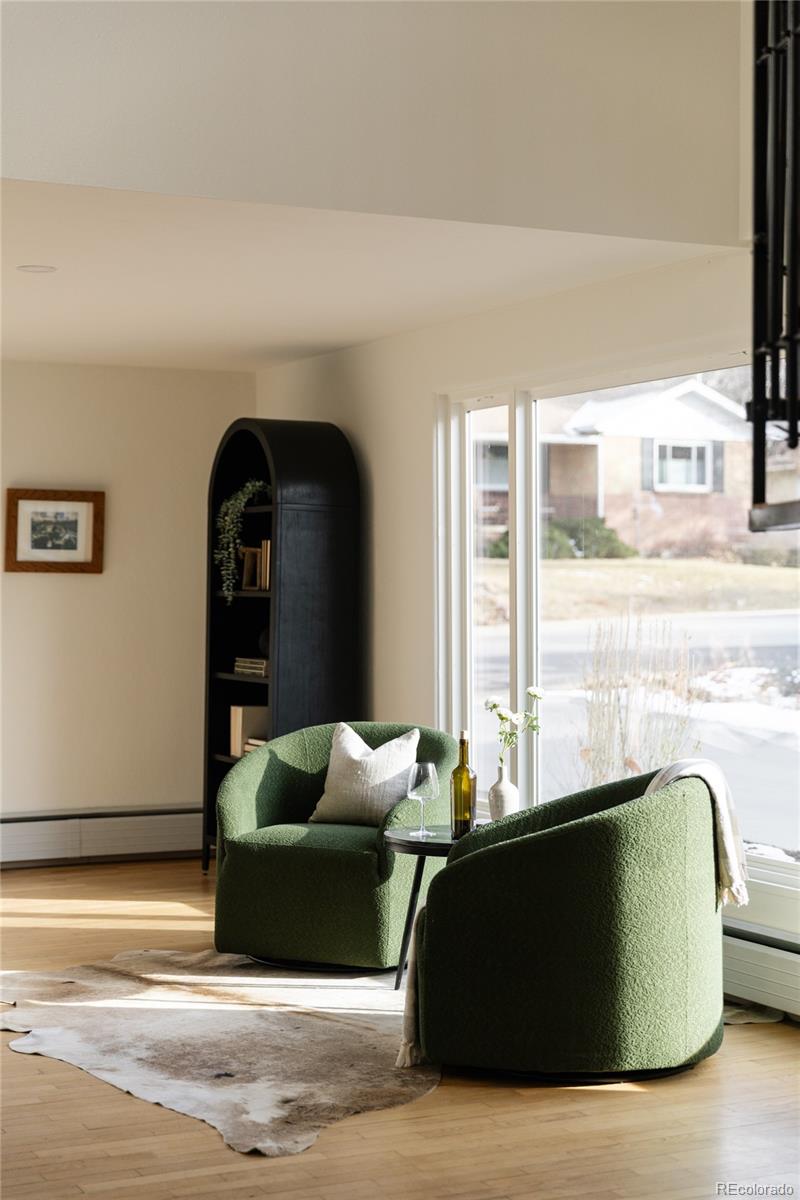 4035 Cody Street Wheat Ridge, CO 80033 - Photo 18 of 47 a living room with furniture and a large window