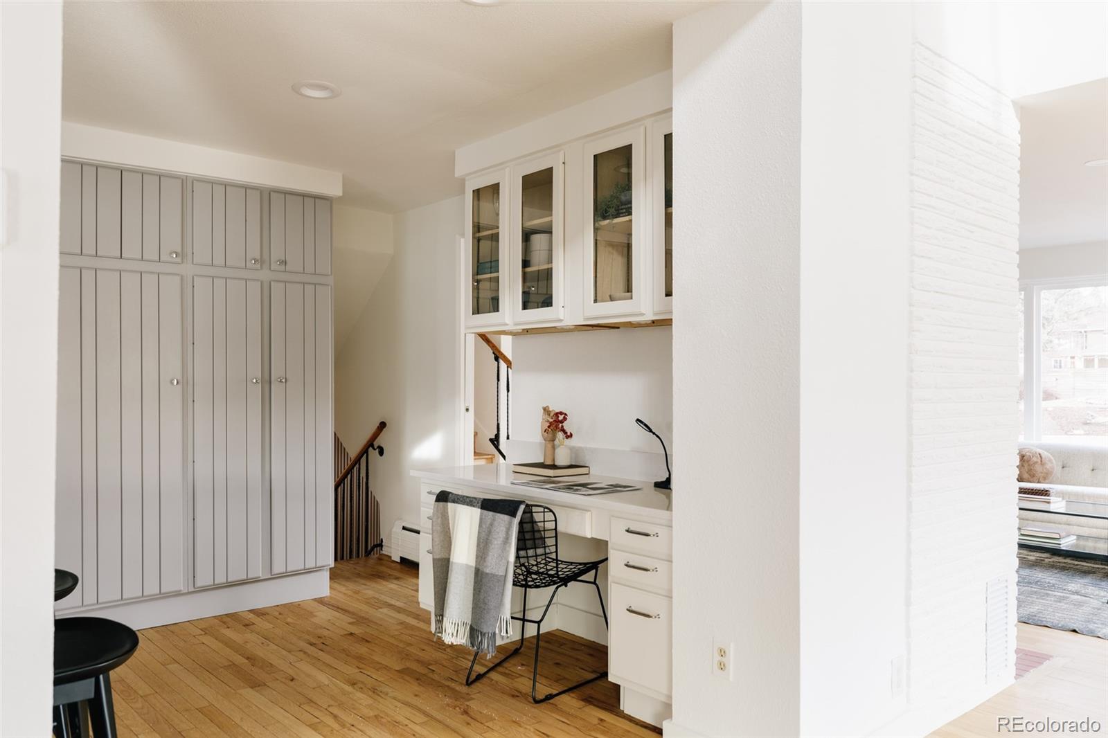 4035 Cody Street Wheat Ridge, CO 80033 - Photo 22 of 47 a workspace with furniture and a window