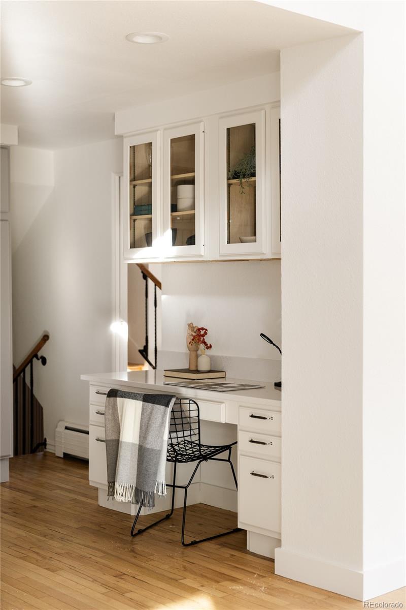 4035 Cody Street Wheat Ridge, CO 80033 - Photo 23 of 47 a view of cabinets and wooden floor