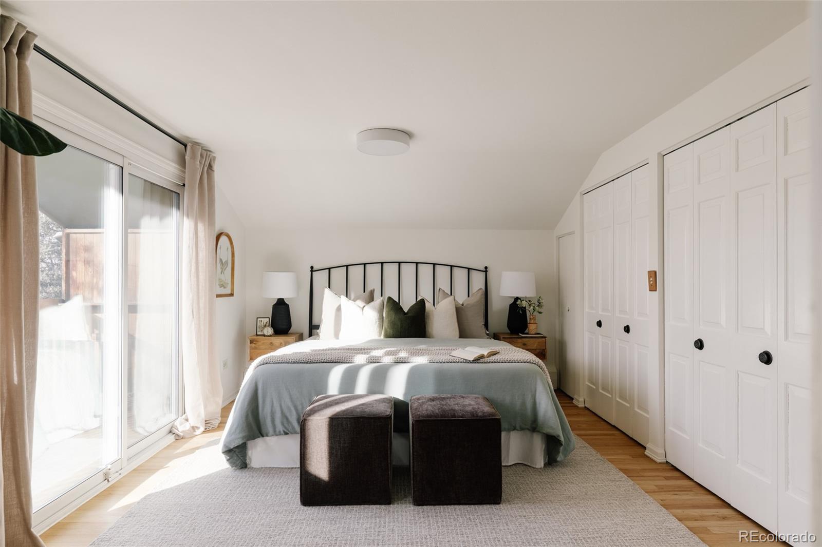 4035 Cody Street Wheat Ridge, CO 80033 - Photo 27 of 47 a bedroom with a bed and a window
