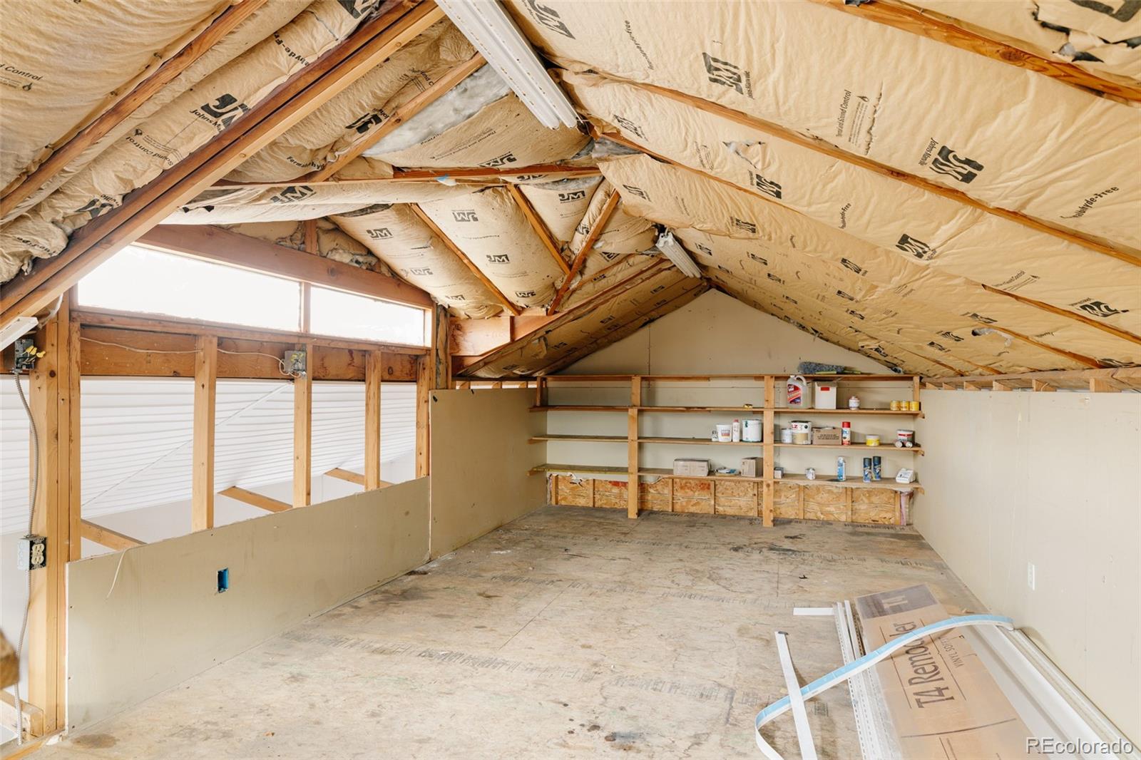 4035 Cody Street Wheat Ridge, CO 80033 - Photo 35 of 47 a view of a room with wooden stairs and door