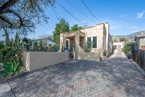 a view of a house with a outdoor space