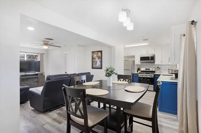 a view of a dining room with furniture