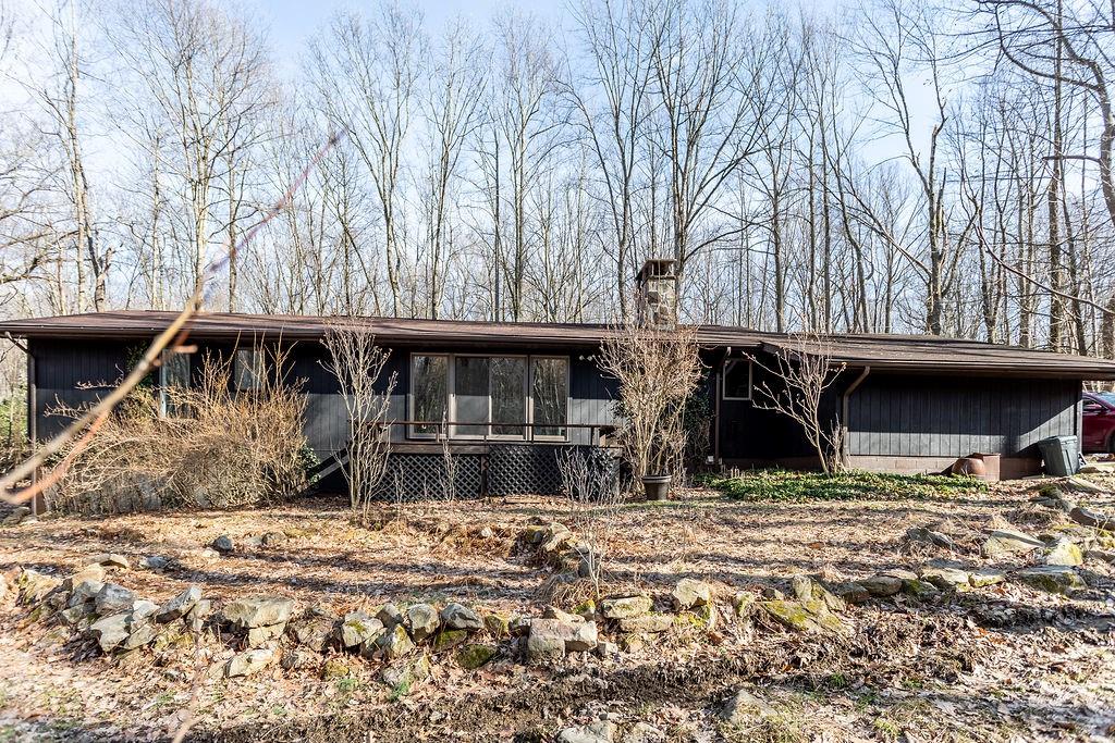 233 Sycamore Road Acme, PA 15610 - Photo 7 of 24 a view of a house with large tree