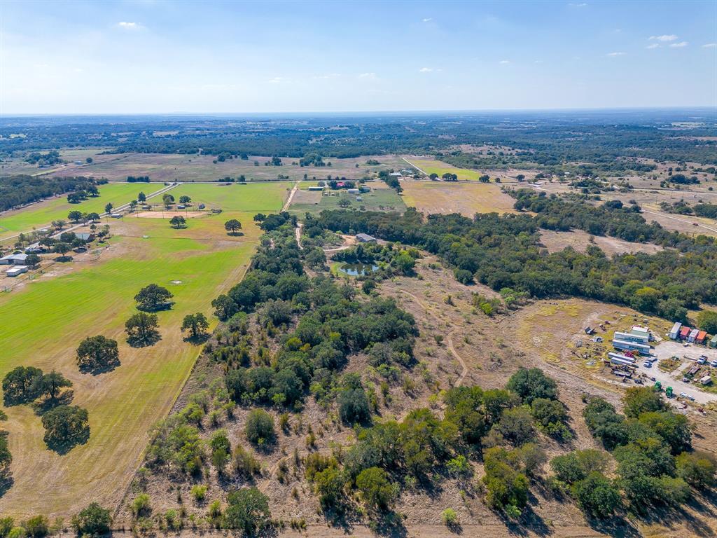 5878 Greenwood Road Millsap, TX 76066 - Photo 11 of 40 an aerial view of ocean and residential houses with outdoor space