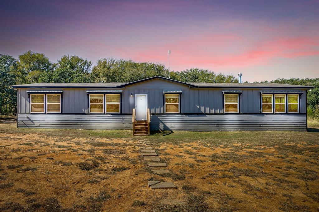 5878 Greenwood Road Millsap, TX 76066 - Photo 6 of 40 a front view of house with yard