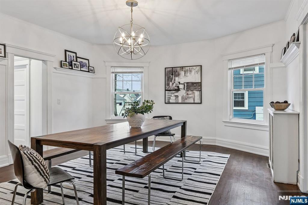 97 Montclair Avenue Montclair, NJ 07042 - Photo 11 of 42 a view of a dining room with furniture and chandelier