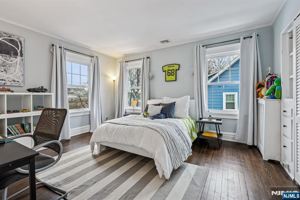 97 Montclair Avenue Montclair, NJ 07042 - Photo 20 of 42 a bedroom with a bed and a desk