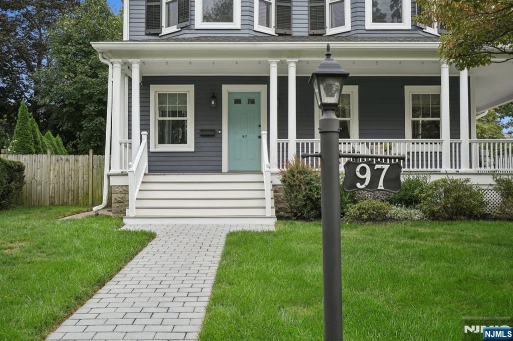 97 Montclair Avenue Montclair, NJ 07042 - Photo 2 of 42 front view of a house with a yard