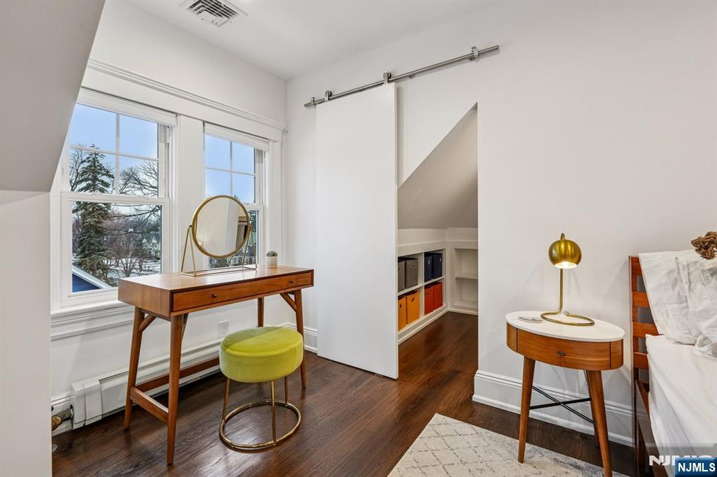 97 Montclair Avenue Montclair, NJ 07042 - Photo 26 of 42 a living room with furniture and wooden floor