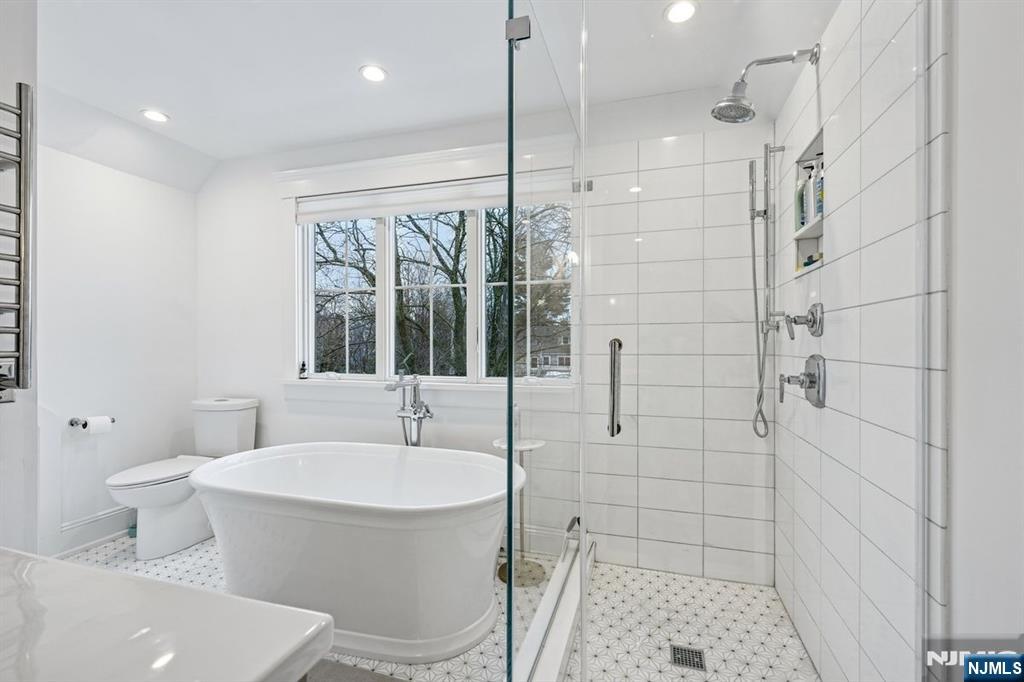 97 Montclair Avenue Montclair, NJ 07042 - Photo 28 of 42 a bathroom with a toilet and a shower