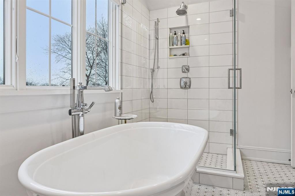 97 Montclair Avenue Montclair, NJ 07042 - Photo 30 of 42 a bathroom with a bathtub and shower