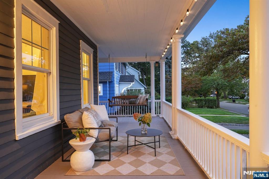 97 Montclair Avenue Montclair, NJ 07042 - Photo 3 of 42 a sitting area with furniture and garden view