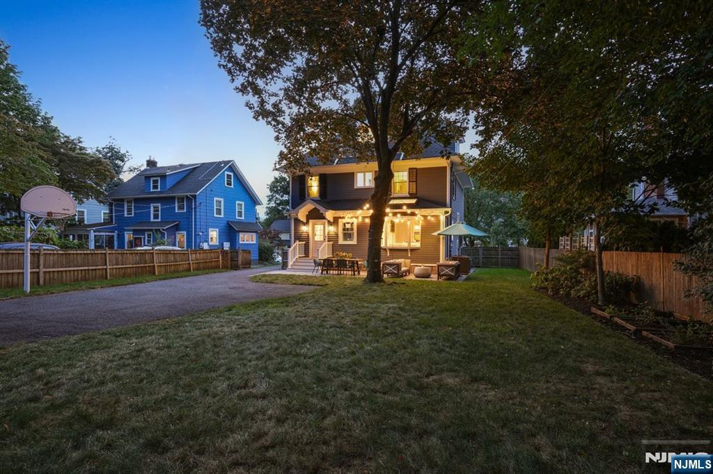 97 Montclair Avenue Montclair, NJ 07042 - Photo 41 of 42 a front view of a house with a yard