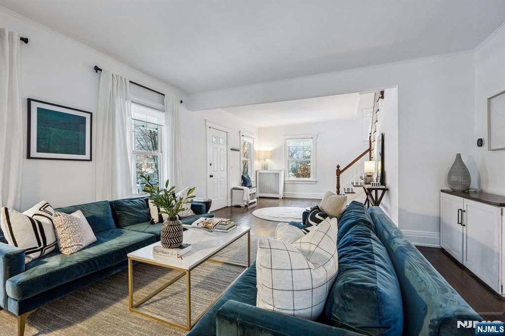 97 Montclair Avenue Montclair, NJ 07042 - Photo 8 of 42 a living room with furniture rug and lamp