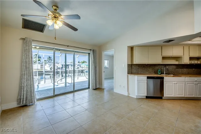 a view of a living room and chandelier