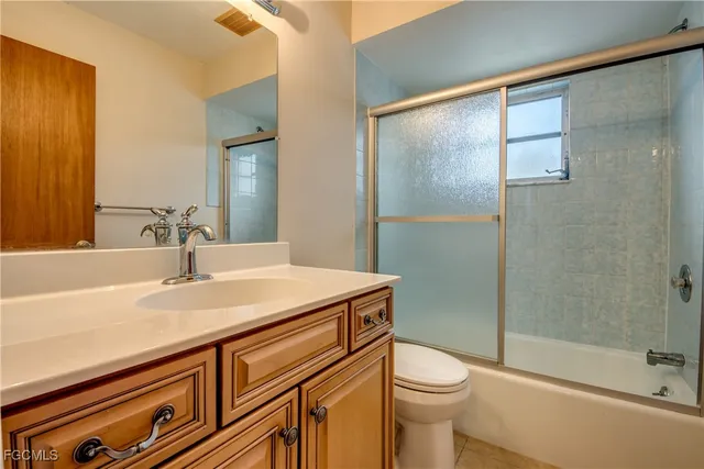 a view of a swimming pool with a porch